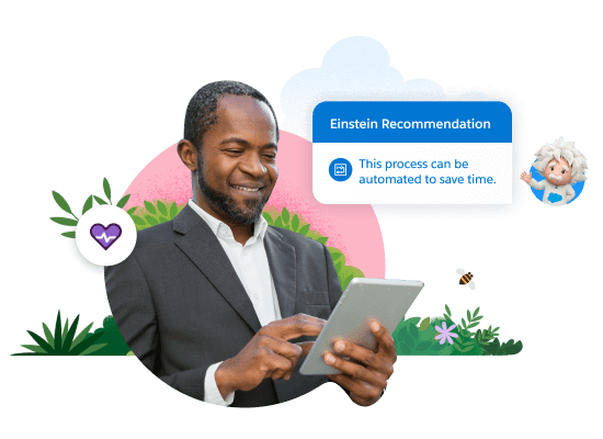 A marketer holding a tablet and smiling.